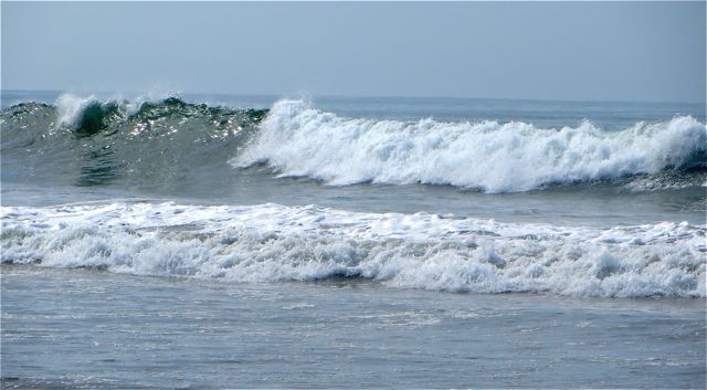 The waves are getting larger and more frequent.