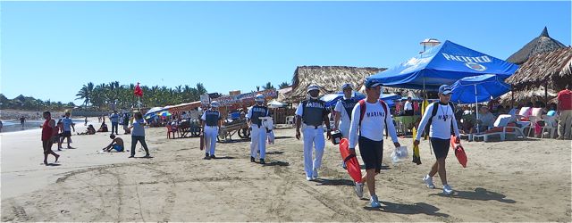 Saw these fine fellows in uniform coming down the beach Sunday. They are here to serve and protect during this busy week of Semena Santa.