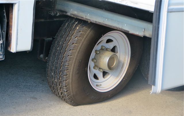 The tire had a lot of pressure on it. Considering that tire hasn't moved in 19 years....amazing.