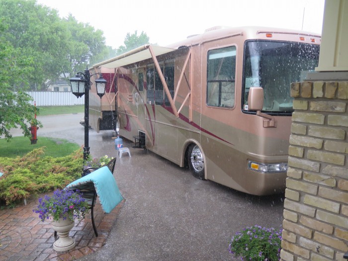 The rain was fierce for long periods of time and then would stop and the sky would clear and 15 minutes later we had very heavy rain once again. This went on all day. But then it got worse when the thunder began. Of course Carmeh went crazy. I believe Colin took this shot.