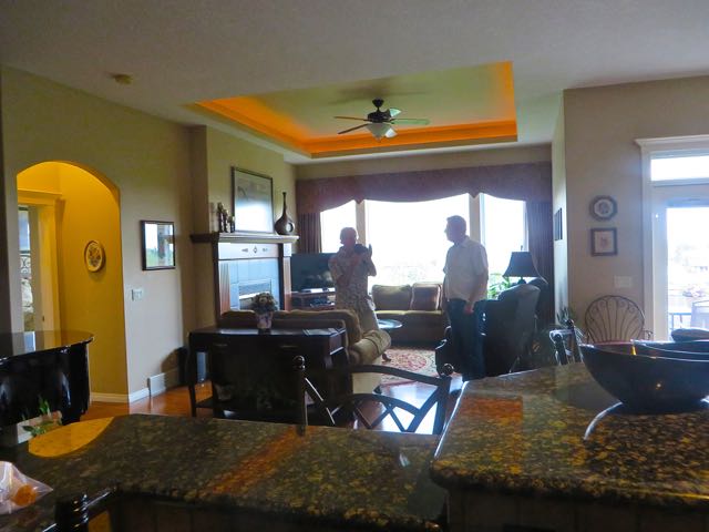 Bob & Gloria also have their home for sale It is a beautiful home but they have plans for an even grandeur home on their lot on Vancouver Island. Here Colin is giving Bob some ideas for better photography of certain areas of the house. Colin just can't seem to stop taking photos.