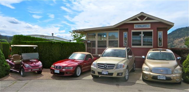 Our driveway has grown by one vehicle. Can you spot which it is?