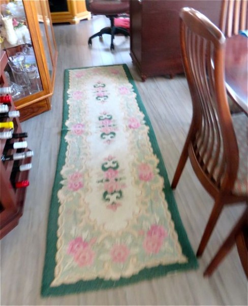 We've even had to put carpet runners here an there and extra area carpets around as Carmeh's back legs have trouble on the wood floor. She needs some traction to help her walk. Even with the carpets she slips here and there.