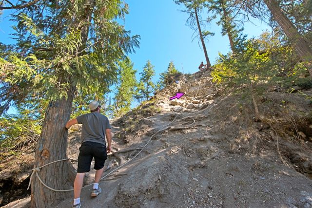 The ropes have been place by hikers. Impossible to go up and down without the rope. The arrow shows where the trail goes straight up.