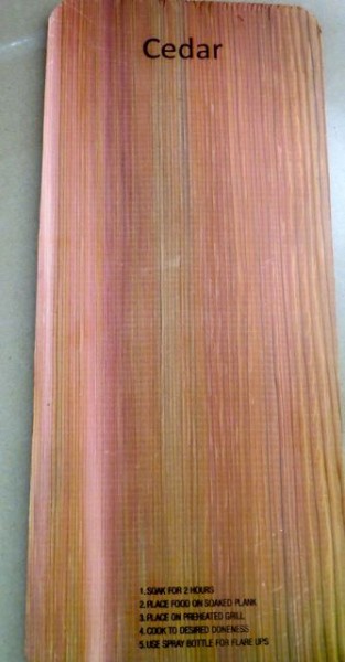 When we do our salmon we soak a cedar plank for several hours. The moisture from the board makes for a melt in your mouth salmon. These are from Costco. Best get them in the spring before they sell out.