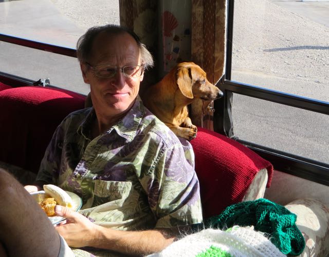 Break time for the worker and his trusty dog Carmeh.