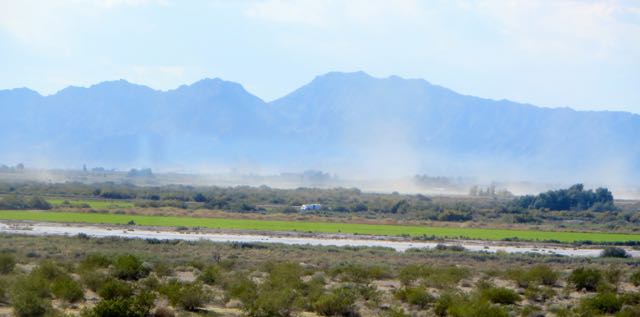 That is Quartzsite over to the right where all that dust is blowing. We looked at each other and wondered what the point of stopping would be if we had to spend all the time inside the RV?