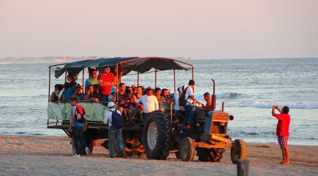 What we refer to as the monkey wagon.....tourists from Mazatlan here for a day tour and being driven past us. Are we the monkeys under observations or are they?