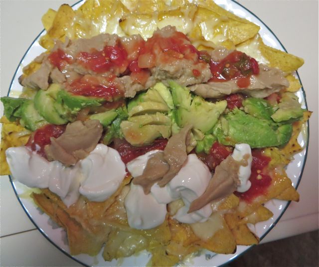 After a late lunch we had an even later dinner but somewhat lighter. My version of nachos with tons of chihuahua cheese, refried beans, guacamole, salsa and sour creme. Not so light a dinner after all, my stomach is full but oh so tasty.