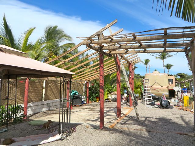 Next step was to take off all of the top lumber as we were replacing all the wood on top. The pinky poles are made of cement and will stay.