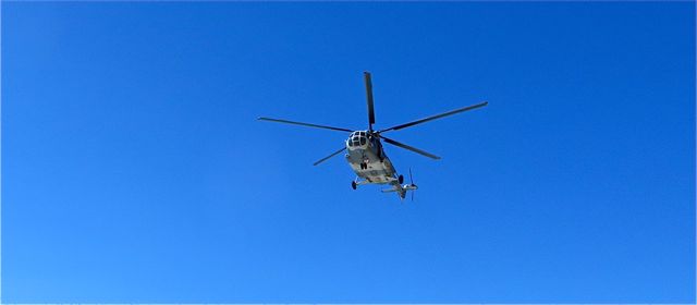 While on our noonish ( late for us ) beach walk we saw this huge jhelicopter fly overhead, It was traveling along the beach line.