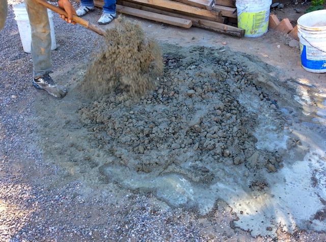 A lot of mixing by hang of the gravel sand and cement. Thanks to Brian, my neighbor for this photo.