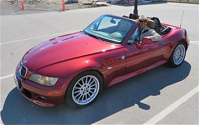 The fellow who bought my Z3, driving away from the insurance company.