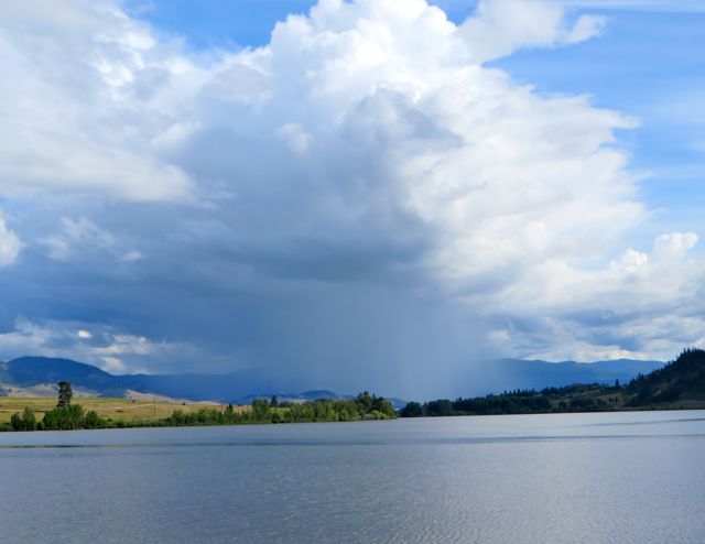 It's raining way back there. Love the cloud colors.