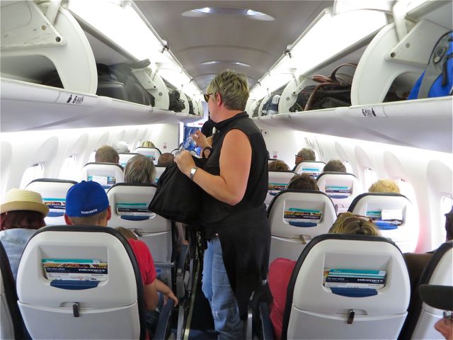 A very tight flight. Even at 5'4" I kept hitting my head on the overhead bins.