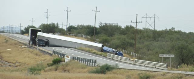 We were detoured around this semi that had jackknifed across the road. No idea how me managed to do this unless it happened lasrt night while he fell asleep at the wheel.