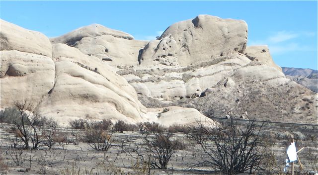 Where these pushed up because of variations of the earth or where they worn down by the wind over the years.