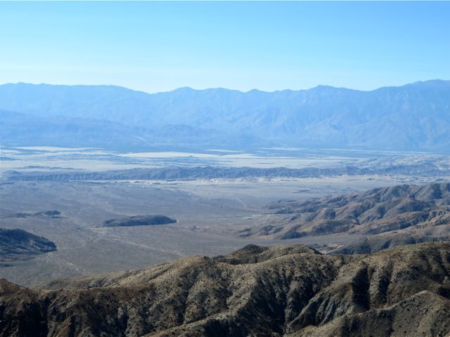 Way up high at 5185 ft at the Keys View point we were treated to something we never thought we would ever see. That dark line mid photo that goes from left to right is the San Andreas Fault.