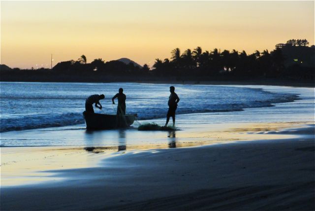 A few young fishermen coming in at the end of the day.