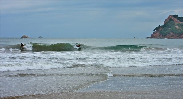 The local yhoung surfers were certainly enjoying the aftermath of the storm.